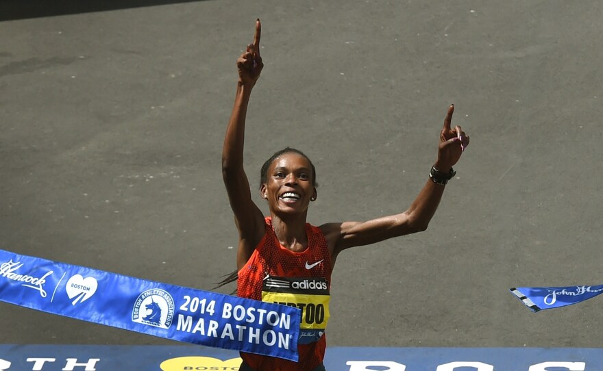 Rita Jeptoo of Kenya crosses the finish line to win the Women's Elite division of the 118th Boston Marathon on April 21.