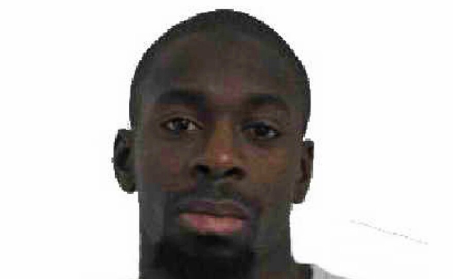 A photo provided by the Paris Police Prefecture Friday, Jan. 9, 2015 shows Amedy Coulibaly.