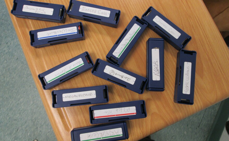 The Hohner Company donated blues harmonicas to Professor Gussow's students, but they can only practice once a week in class. They're forbidden to take the harmonicas back to their living quarters.