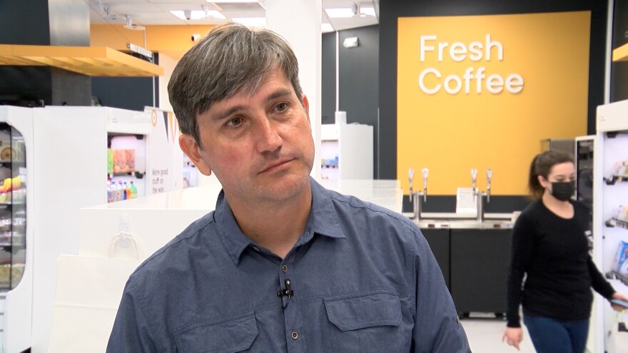 Marius Buibas stands in San Diego's autonomous store, Valet Market. He is Co-founder and Chief Technology Officer for Eccel Rototics, which runs the store.
