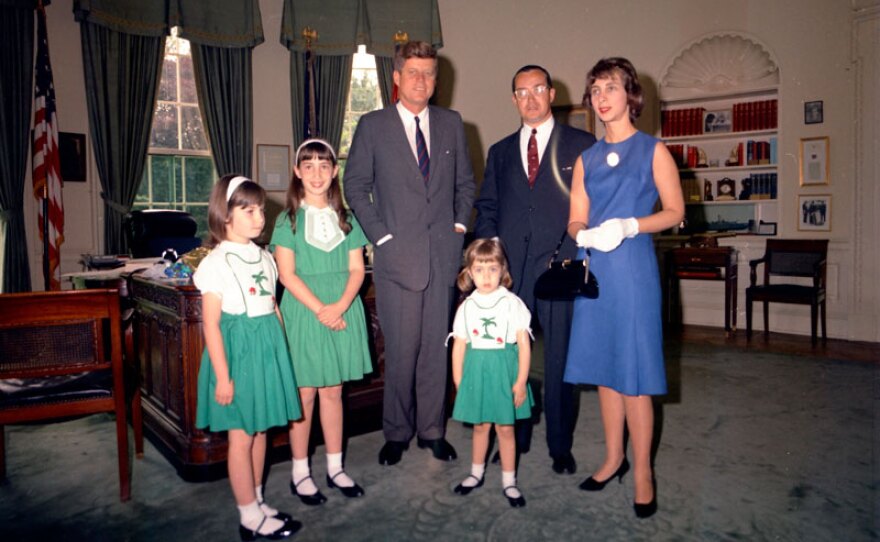 FCC chairman Newton Minow and family with President John F. Kennedy.