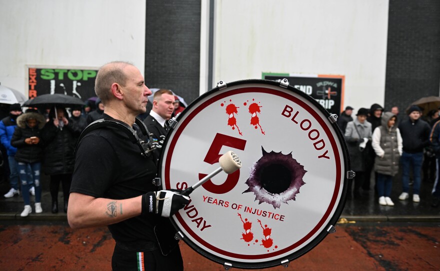 A republican bandsman beats his drum as he takes part in Bloody Sunday March to Free Derry Corner.