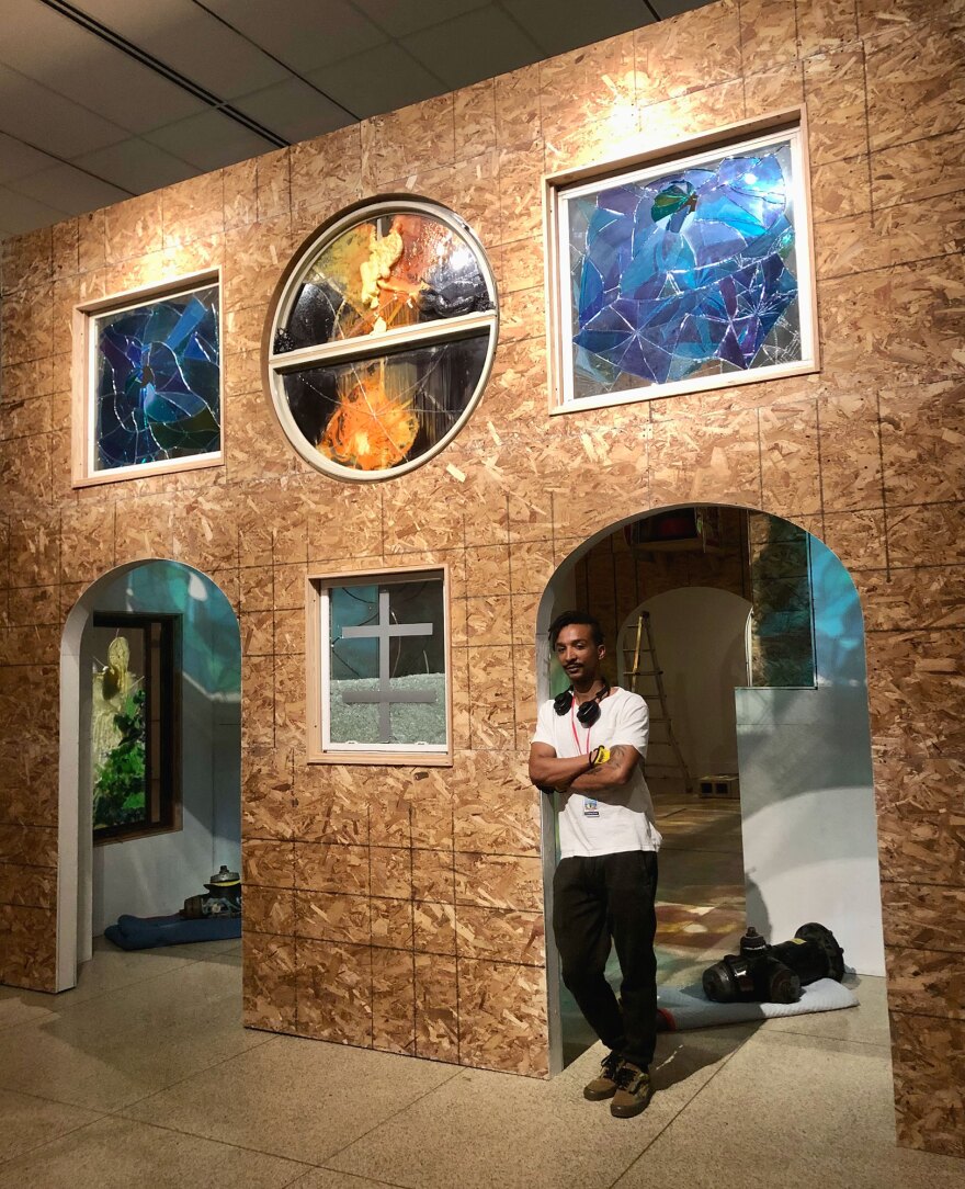 Artist Justin Sterling is shown during the installation process of "Chapel of the Rocks" at the San Diego Museum of Art on Oct. 25, 2022. The exhibition opens Oct. 29.