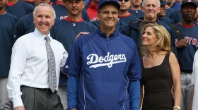 During happier times, Frank and  Jamie McCourt hang out with manager Joe Torre before a 2008 Dodger game.