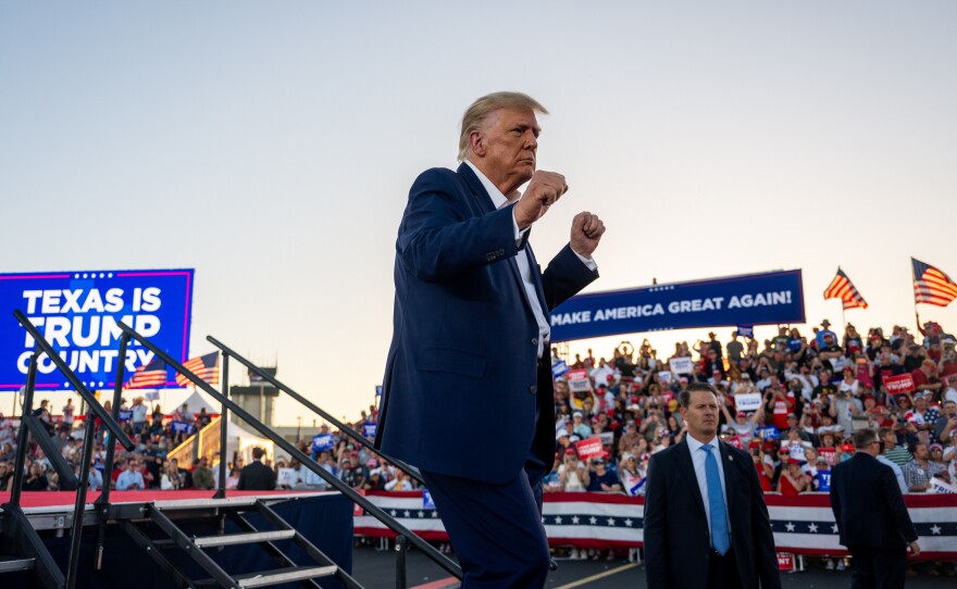 Former President Donald Trump dances after speaking at a rally at the Waco Regional Airport last March in Waco, Texas.