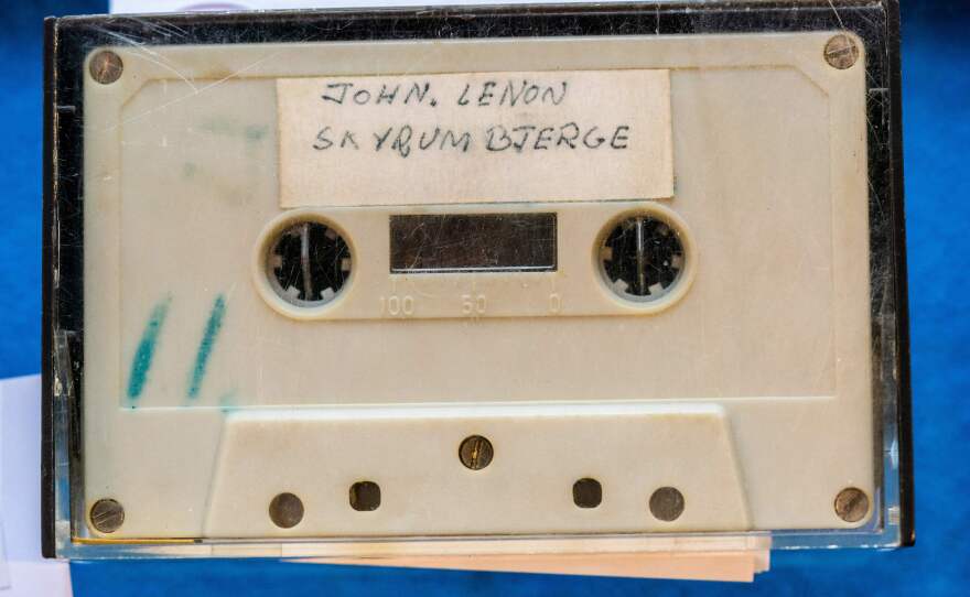 The cassette contains a 33-minute recording of Lennon (and sometimes Ono) speaking to young journalists and singing two songs.