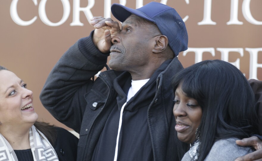 Stanley Wrice, center, pauses in December 2013 as he speaks to the media with his lawyer Heidi Linn Lambros, left, and his daughter, Gail Lewis, while leaving Pontiac Correctional Center in Pontiac, Ill. Wrice was released after serving more than 30 years. He claimed for decades that Chicago Police detectives under the command of then-Lt. Jon Burge beat and coerced him into confessing to rape.