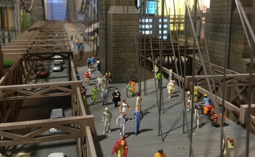 The exhibition's New York display, including a miniature Brooklyn Bridge, was created by local model-makers.