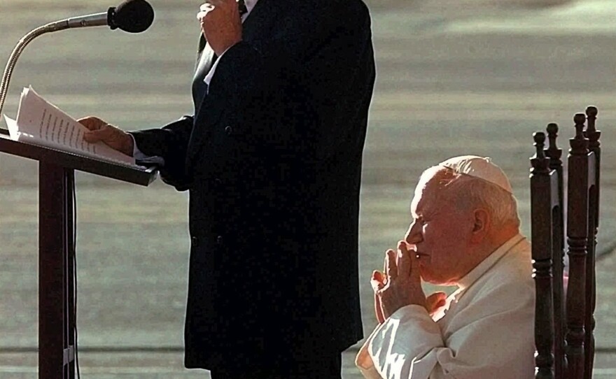 Pope John Paul II listens as Castro makes remarks on Jan. 21, 1998, during a welcoming ceremony at Jose Marti Airport in Havana. The pope arrived for a historic five-day visit.