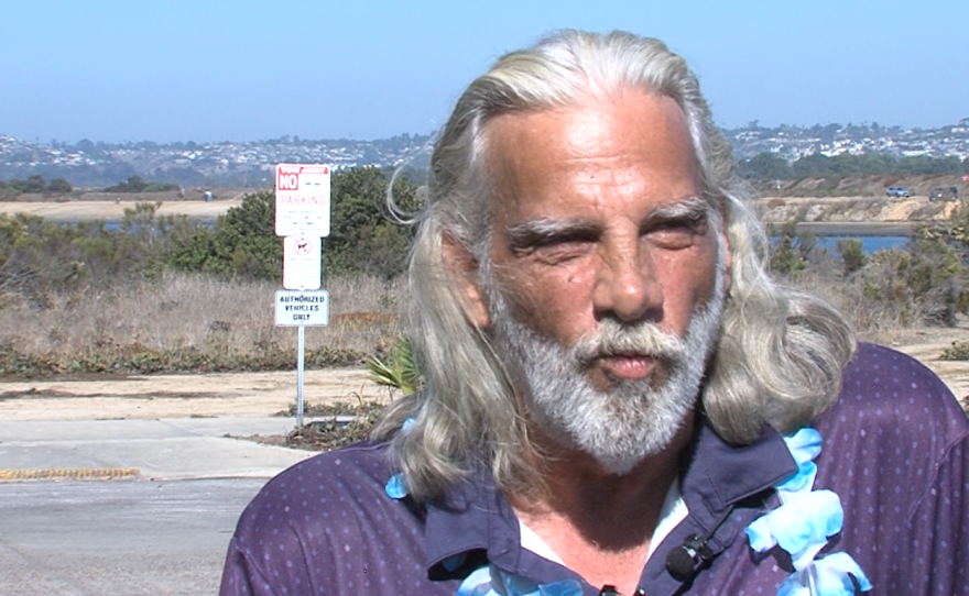 Kevin Denczek, who lives in his RV, is shown being interviewed at South Shore Boat Launch on November 4, 2025.
