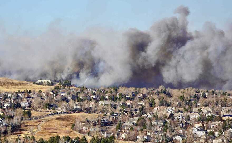 Dec. 30: Superior, Colo. — Smoke fills the air as a wind-driven wildfire forced evacuations.