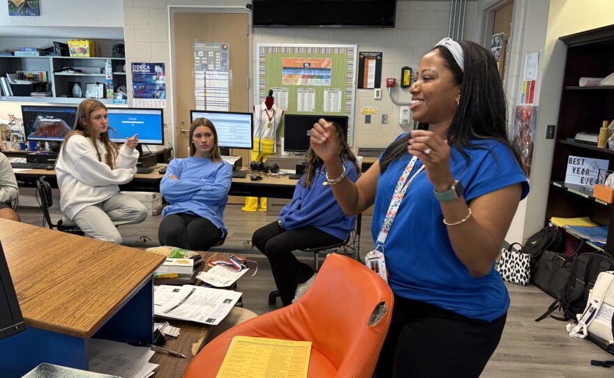 AP Business with Personal Finance teacher Gerri Kimble talks with students about their part time jobs and saving their earnings at Hoover High School on October 6, 2026.