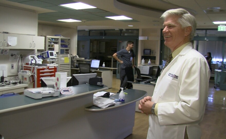 Robert Smith talks with staff after the announcement that he will take over as the new director of the VA San Diego healthcare system, July 22, 2106.