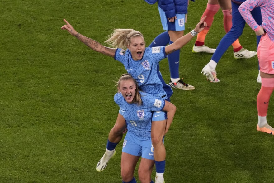 England's Rachel Daly and England's Georgia Stanway celebrate after the Women's World Cup semifinal soccer match between Australia and England at Stadium Australia in Sydney, Australia, Wednesday, Aug. 16, 2023.