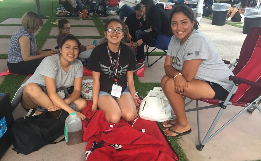 From left: Kristina Contreras, Alexa Hernandez and Angelica Contreras wait first in line for the Thursday panels in Hall H, July 20, 2017.