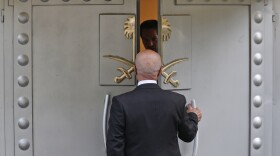 A man enters Saudi Arabia's consulate in Istanbul, Friday, Oct. 19, 2018.