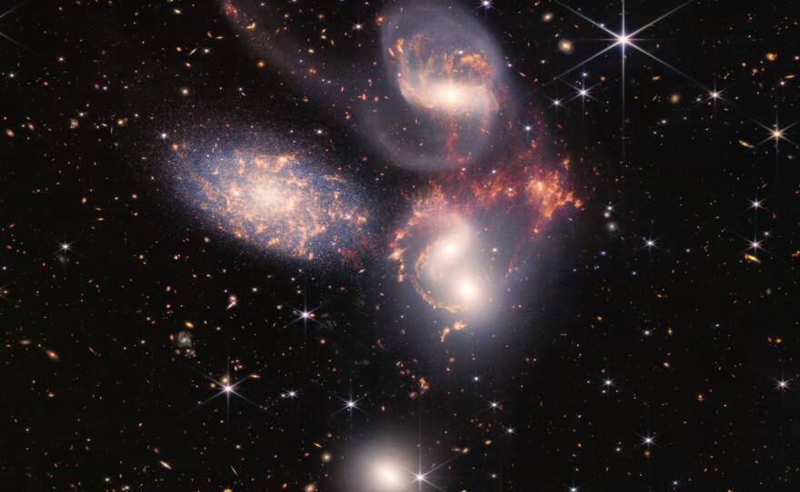 An enormous mosaic of Stephan's Quintet is the largest image to date from NASA's James Webb Space Telescope, covering about one-fifth of the Moon's diameter. It contains over 150 million pixels and is constructed from almost 1,000 separate image files. The visual grouping of five galaxies was captured by Webb's Near-Infrared Camera (NIRCam) and Mid-Infrared Instrument (MIRI).