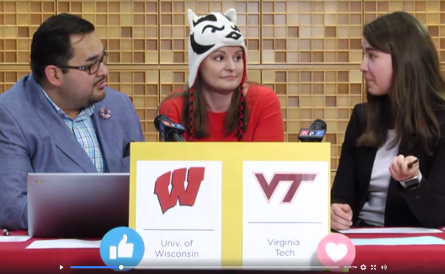 NPR staffers (also known as Nippers) Joe Ruiz, Julie Rogers and Laura Roman appear on NPR Live discussing the NCAA Men's Basketball Tournament. Rogers, a historian on NPR's Research, Archives and Data Strategy team, is representing her alma mater, the Wisconsin Badgers, with her choice of headwear.