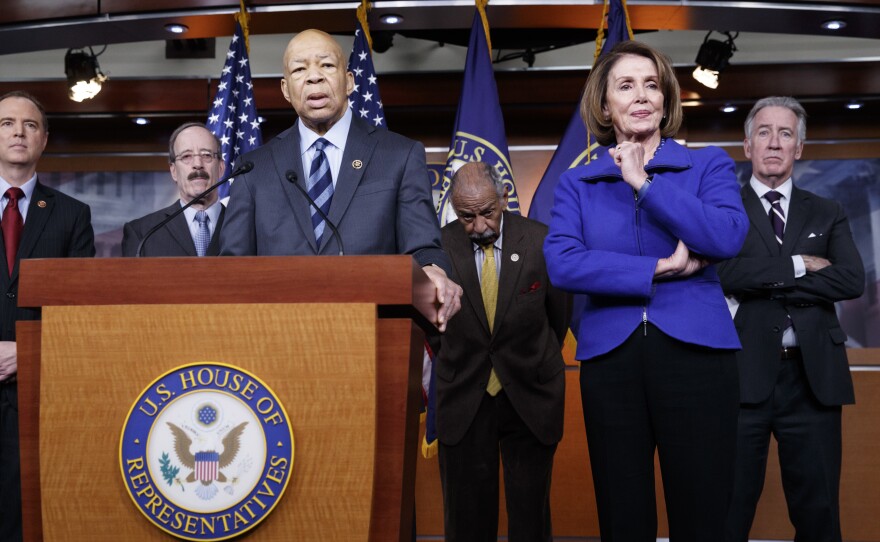 Top House Democrats, including Rep. Elijah Cummings, D-Md. (at the podium), said this week they want an investigation into President Trump's connections with Russia, such as when he learned that his national security adviser, Michael Flynn, had discussed U.S. sanctions with a Russian diplomat.