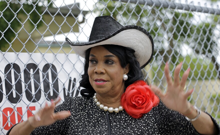 Rep. Frederica Wilson, D-Fla., talks to reporters, Wednesday, Oct. 18, 2017, in Miami Gardens, Fla. 