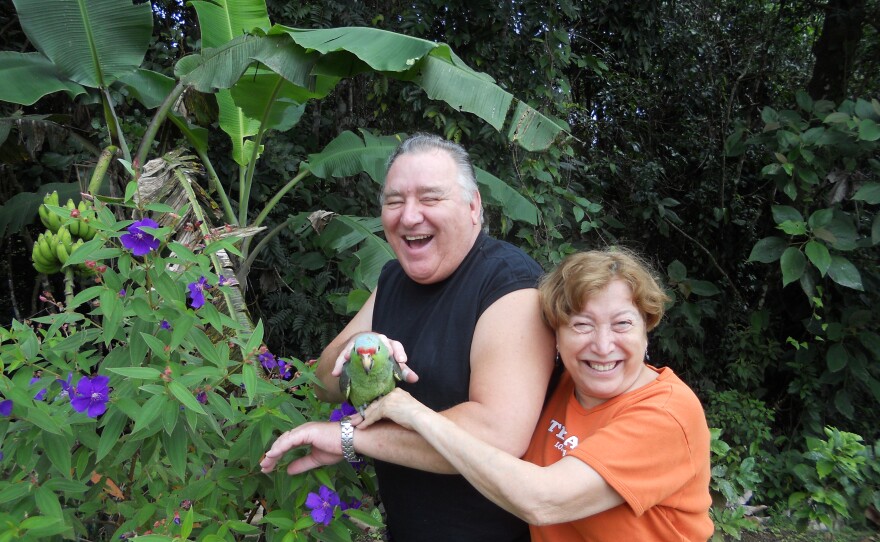 John and Blanca Dungan with their pet parrot. At first, they were very happy in Costa Rica.