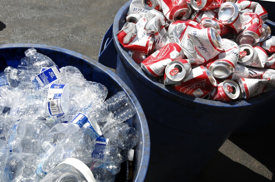 In this July 5, 2016, file photo, cans and plastic bottles brought in for recycling are seen at a recycling center in Sacramento, Calif.