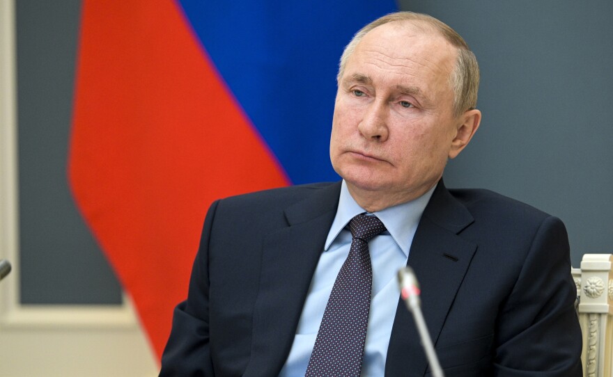 Russian President Vladimir Putin is shown at a meeting on Wednesday. The U.S. is imposing new sanctions against a group of Russian entities and personnel.