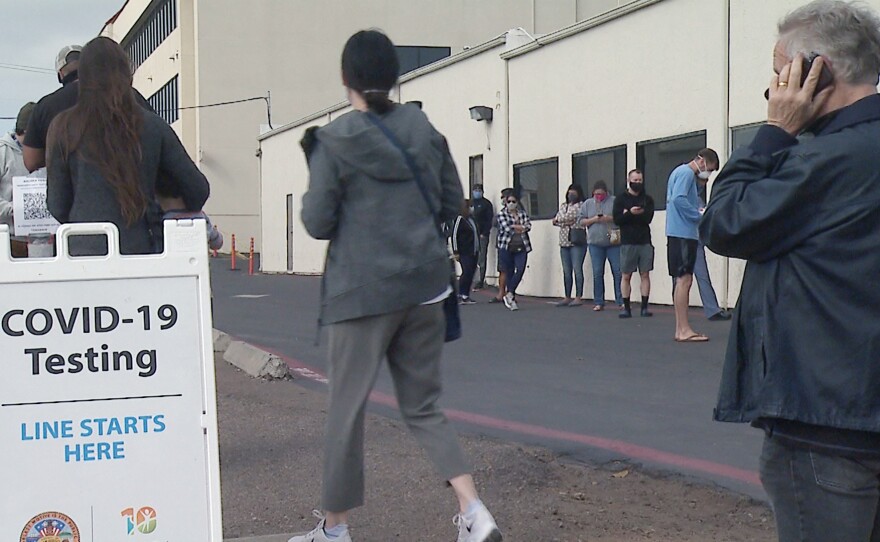 A long line of people waiting to get tested at the USD Former USD Electronics Recycling Center testing site. Nov. 23, 2020. 