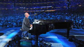 Superstar Billy Joel at his piano performing in New York City's Shea Stadium in July 2008. 