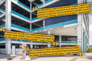 An illustration of the San Diego Police Department COVID-19 vaccination exemption requests is overlaid on an undated file photo of the SDPD headquarters.