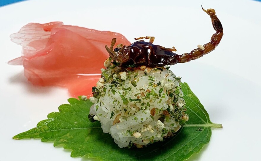 People with prior edible insect experience often like food where the insect is visible as in chef Joseph Yoon's Manchurian Scorpion Sesame Rice Ball. Undated photo.