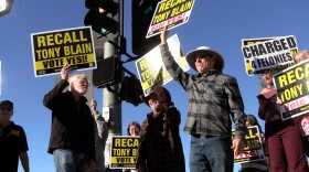 More than a dozen Poway residents rally at the corner of Espola and Valle Verde roads to get out the vote to recall embattled Councilmember Tony Blain, Oct. 28, 2025.