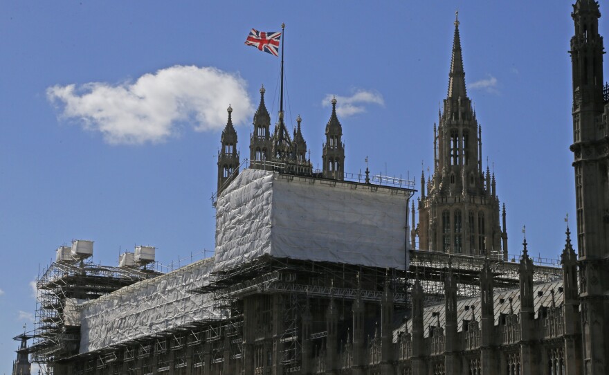 Scaffolding surrounds a section of the Houses of Parliament in London in September 2016.