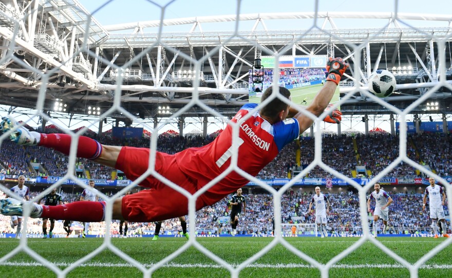 Hannes Halldorsson of Iceland saves a penalty kick by Lionel Messi of Argentina on Saturday in Moscow.