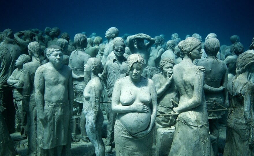 The Silent Evolution, by Jason deCaires Taylor, in Cancun, Mexico.