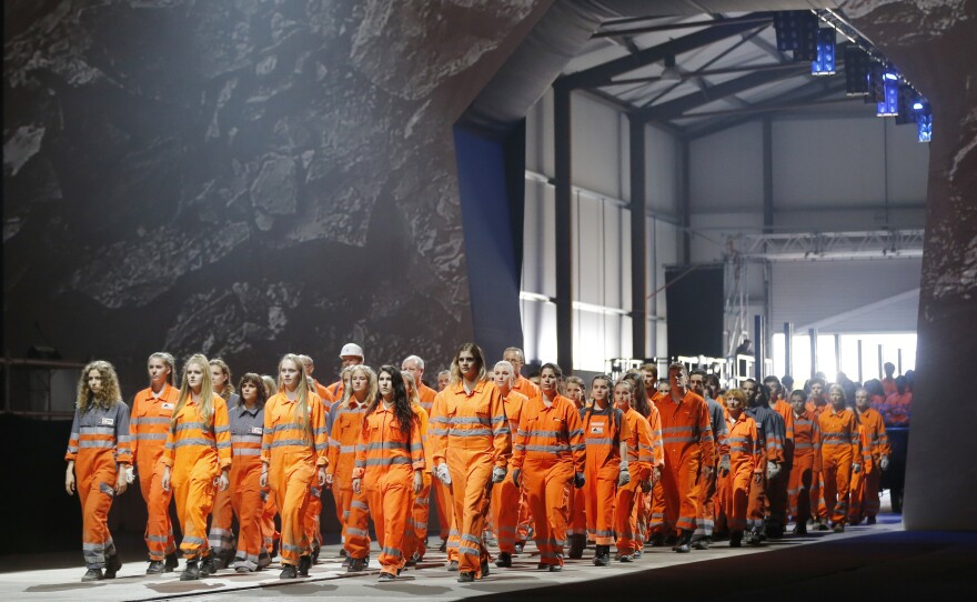 Artists perform in Erstfeld, Switzerland, on Wednesday at the opening of the Gotthard rail tunnel. The show was directed by German director Volker Hesse.