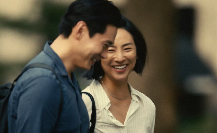 Teo Yoo and Greta Lee star as Hae Sung and Nora, childhood sweethearts who reconnect decades later in <em>Past Lives.</em>