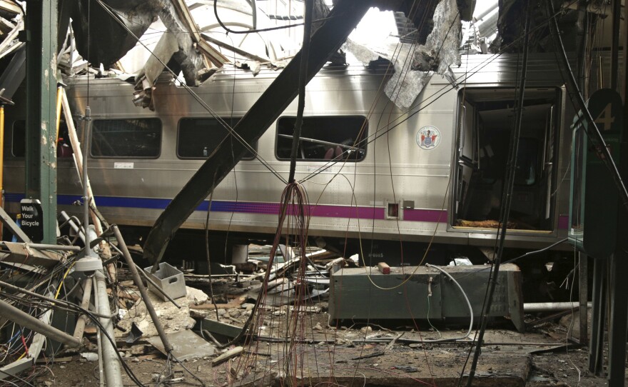 New Jersey's Hoboken Terminal after a commuter train crash that killed one person and injured more than 100 others last week. Preliminary findings gleaned from video and data recorders indicate the train was traveling at twice the 10 mph speed limit just before the collision.