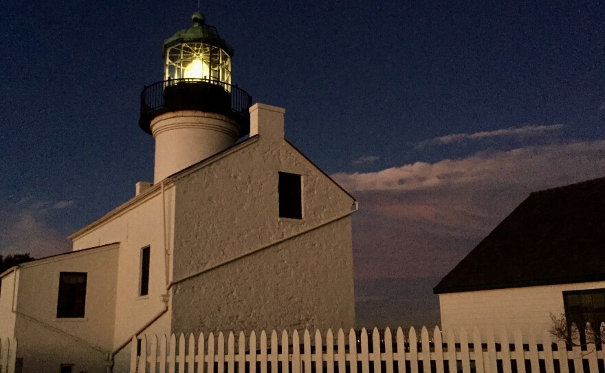 A large, jewel-like Fresnel lens lights up Old Point Loma Lighthouse, Nov. 7, 2017.