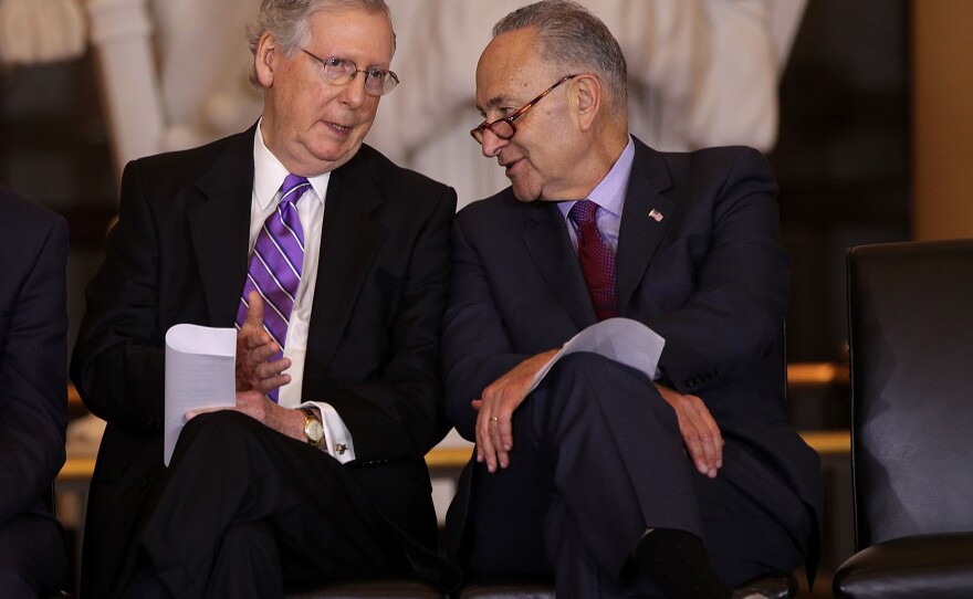 Senate Majority Leader Mitch McConnell (left) chats with Senate Minority Leader Chuck Schumer in October.