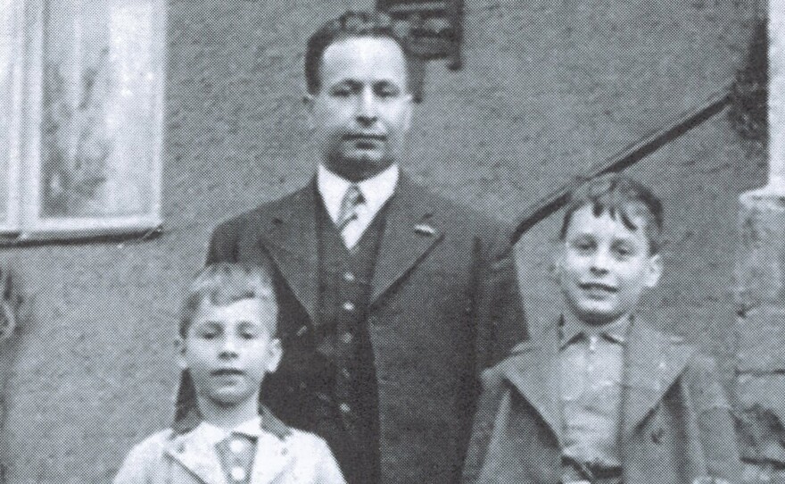 John Fieldsend (left), age 7, with his father, Curt Feige, and older brother, Arthur, age 10, in the final photograph taken of them together in 1939, on the day the boys boarded a Kindertransport train bound for England. Curt Feige and his wife, Trude, were murdered by the Nazis at Auschwitz in 1943.