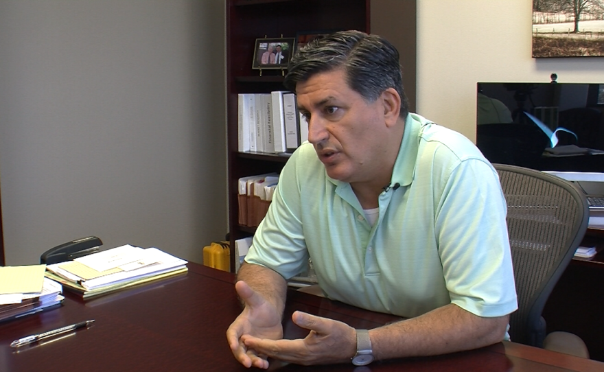 Sohaib Alagha, vice president of the Syrian American Council and a San Diego resident, sits in his office on Aug. 26, 2015.