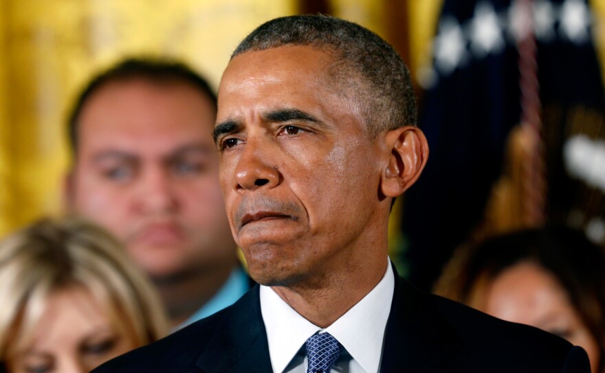 President Barack Obama announces steps the administration is taking to reduce gun violence while delivering a statement today in the East Room of the White House.