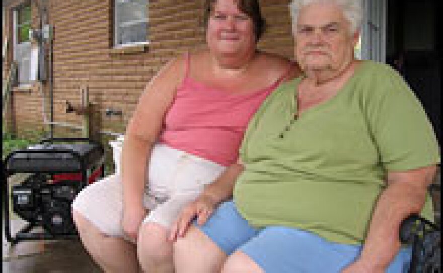 Evelyn Al-Dubais (left) and her mother, Linda Coen, of southwest Houston lost power during Hurricane Ike. On Sunday, they went to Home Depot to buy a generator.