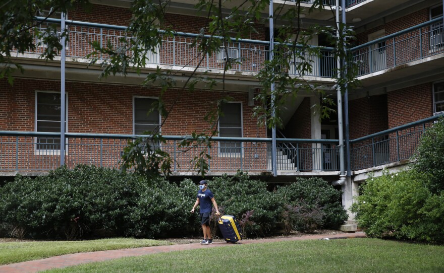 Students move out of UNC dorms after multiple coronavirus clusters forced the university to go online-only.