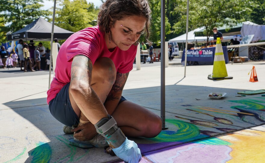Chelsea Ritter-Soronen creates a mural.