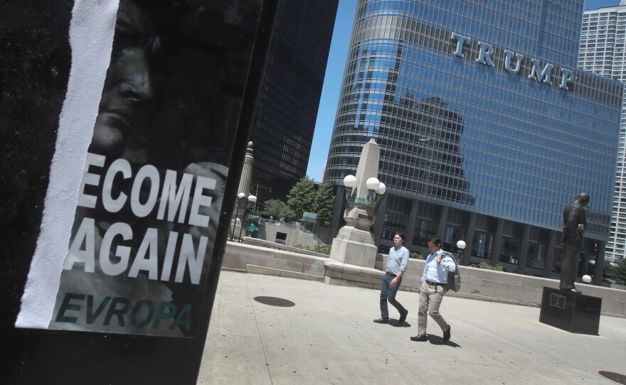 A defaced recruiting flyer for Identity Evropa hangs near Trump Tower in Chicago, in July 2016. The flyer which read "Let's Become Great Again" was part of a 17-city recruitment effort by the white nationalist organization.