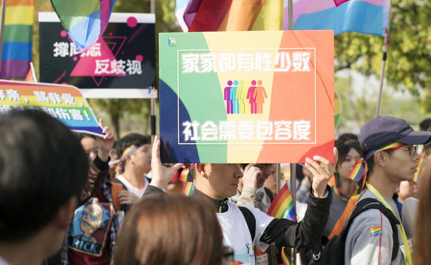 Days after Weibo announced it would ban homosexual content, an already-planned rally was held in Nanjing, China, to raise awareness of discrimination against homosexuals. This photo from Sunday was released to the AP by the Jiangsu Tongtian Volunteer Group, which said more than 20,000 people took part in the "Rainbow Marathon" event.