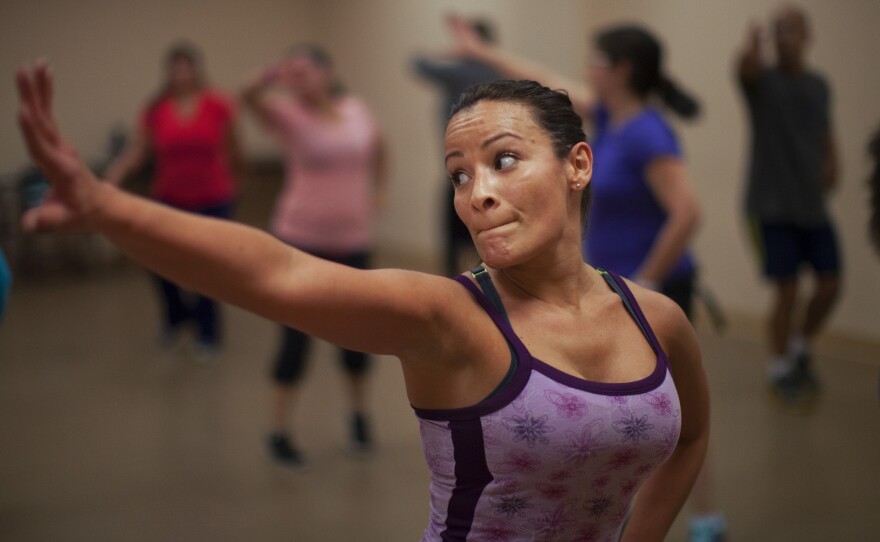 Melissa Colon dances in a zumba class at the Robert Guevara Community Center in Kissimmee.