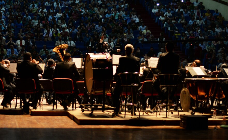 The Iraqi National Symphony Orchestra performs in Baghdad. The concert was promoted by word of mouth to avoid being targeted by bombs.